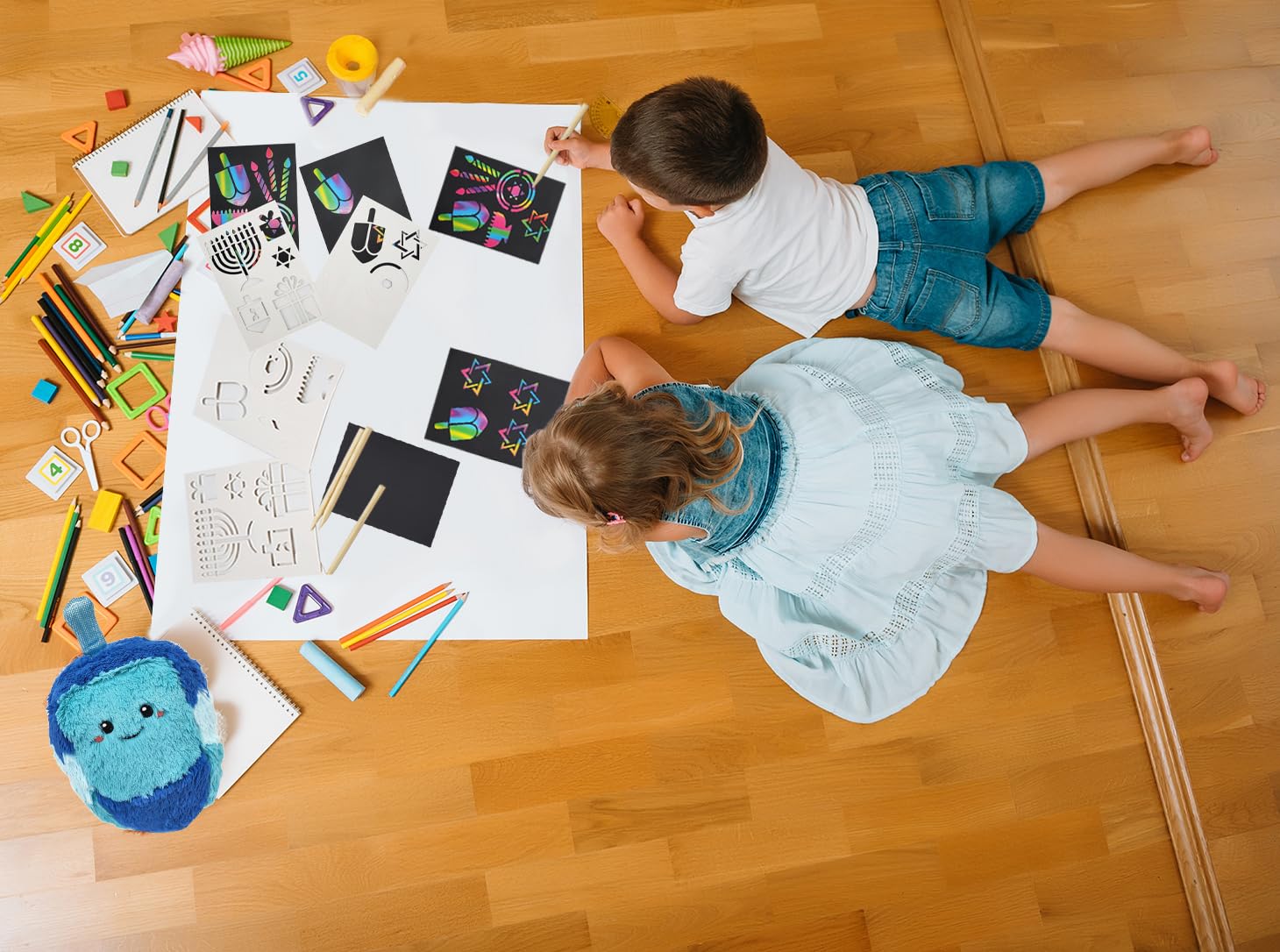 The Dreidel Company 12-Pack Hanukkah Scratch Stencil Art Kit, Rainbow Scratch Art for Kids with Stencils, Bookmarks & Holiday Themed Shapes, Magic Drawing Coloring Sheet Set School Decor (12-Pack) - Image 3