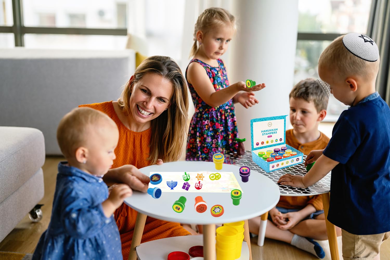 The Dreidel Company Box of Twelve Multicolored Hanukkah Stampers, Each Stamp Includes A Fun Chanukkah Icon Including Menorah, Dreidels and Coins, 12-Pack Box - Image 5